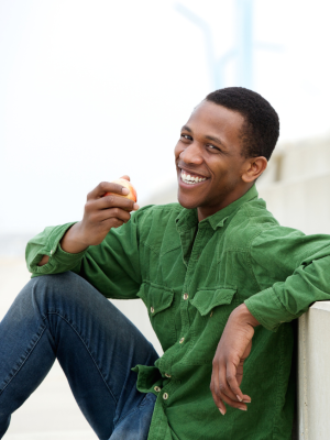 Man eating apple